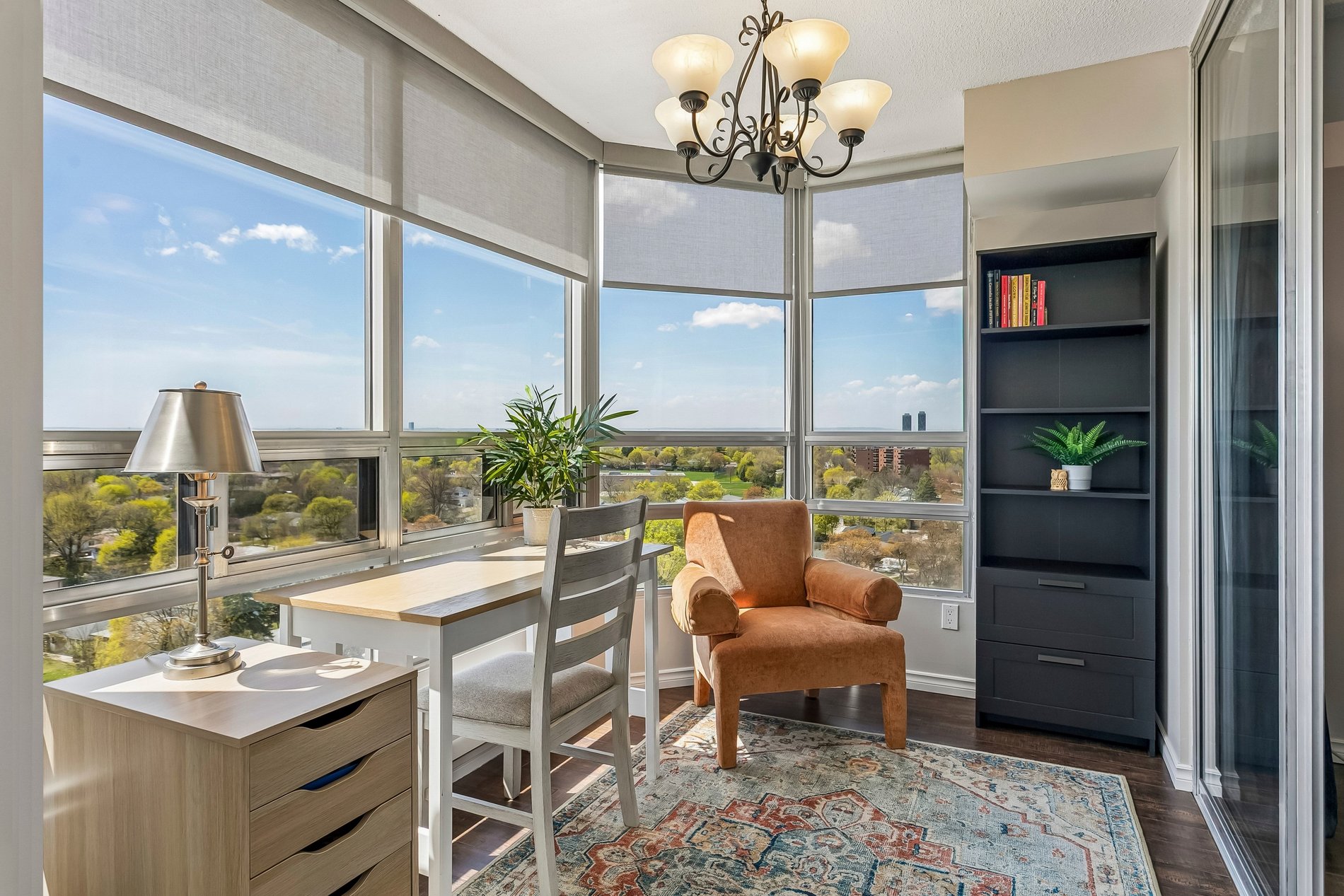 Home office nook with large windows and panoramic city views