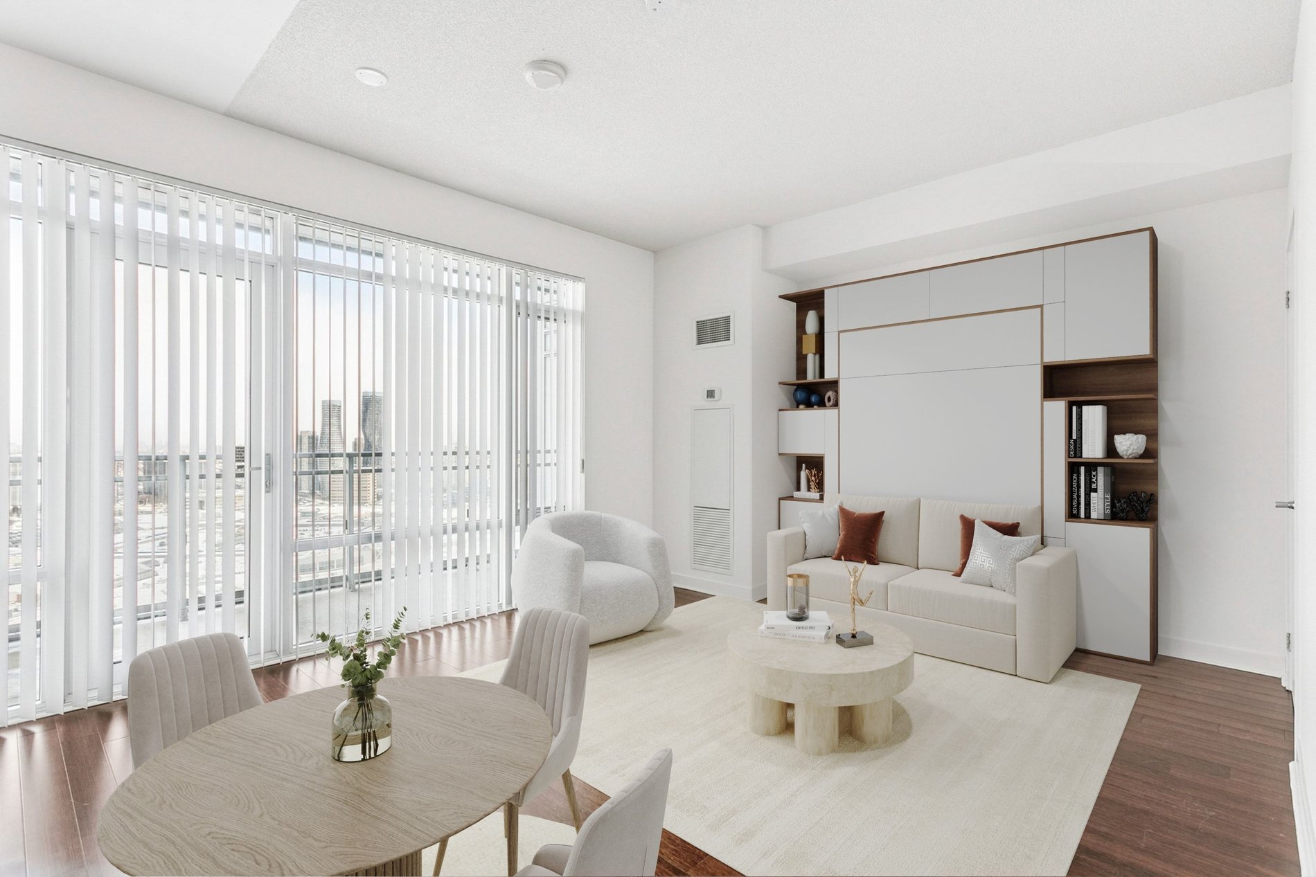 Bright living area with built-in wall bed and dining space