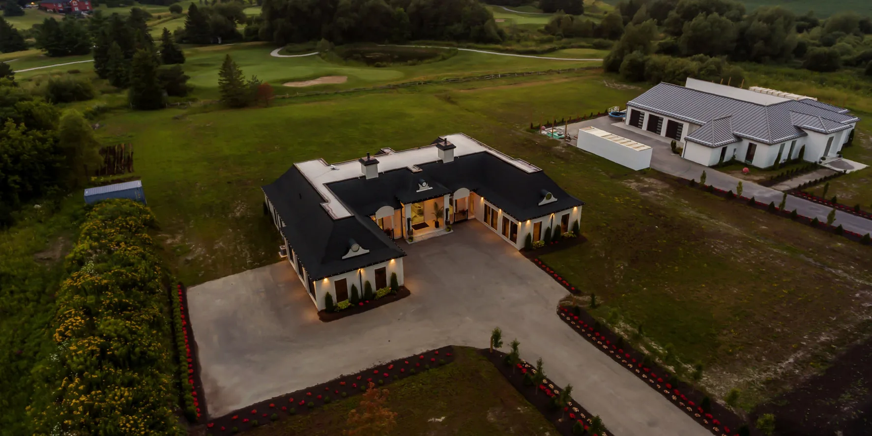 Twilight aerial perspective of a premium GTA property