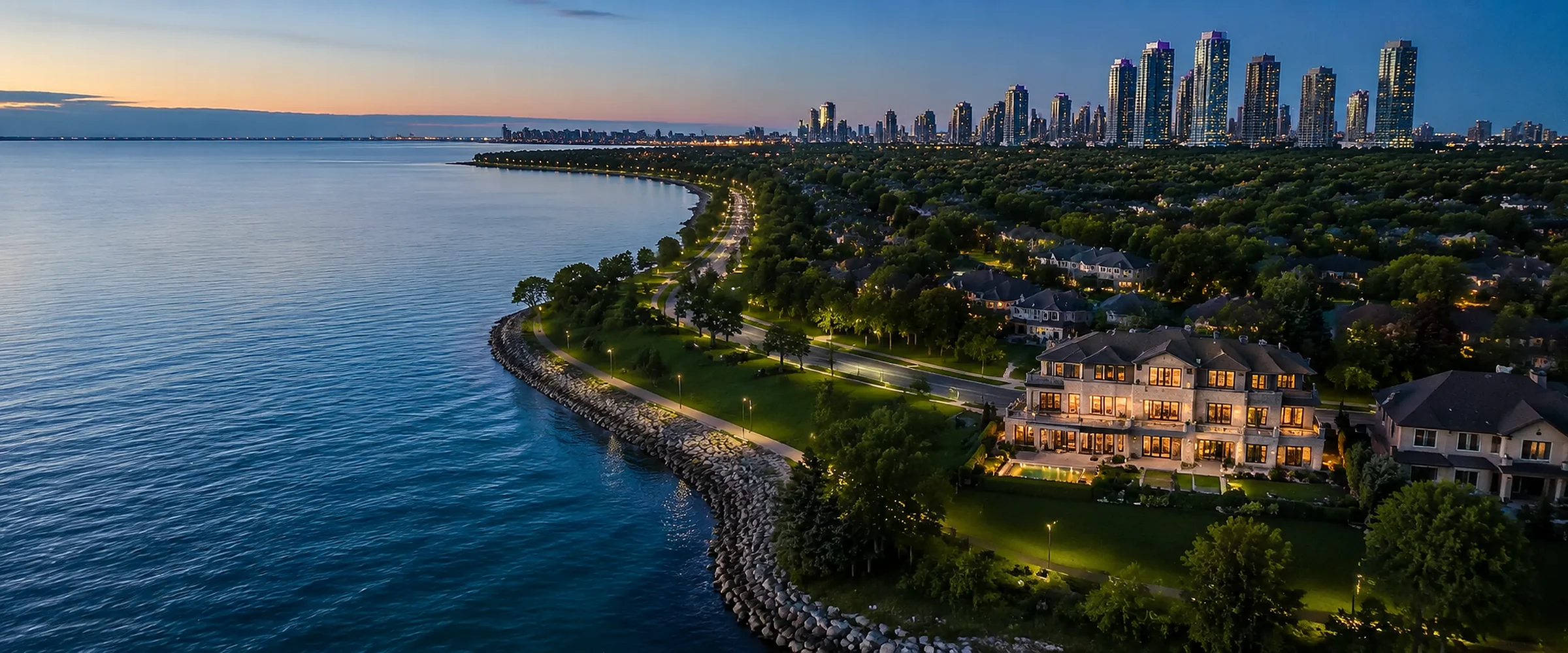 Camera drone capturing a luxury Mississauga lakefront home at dusk