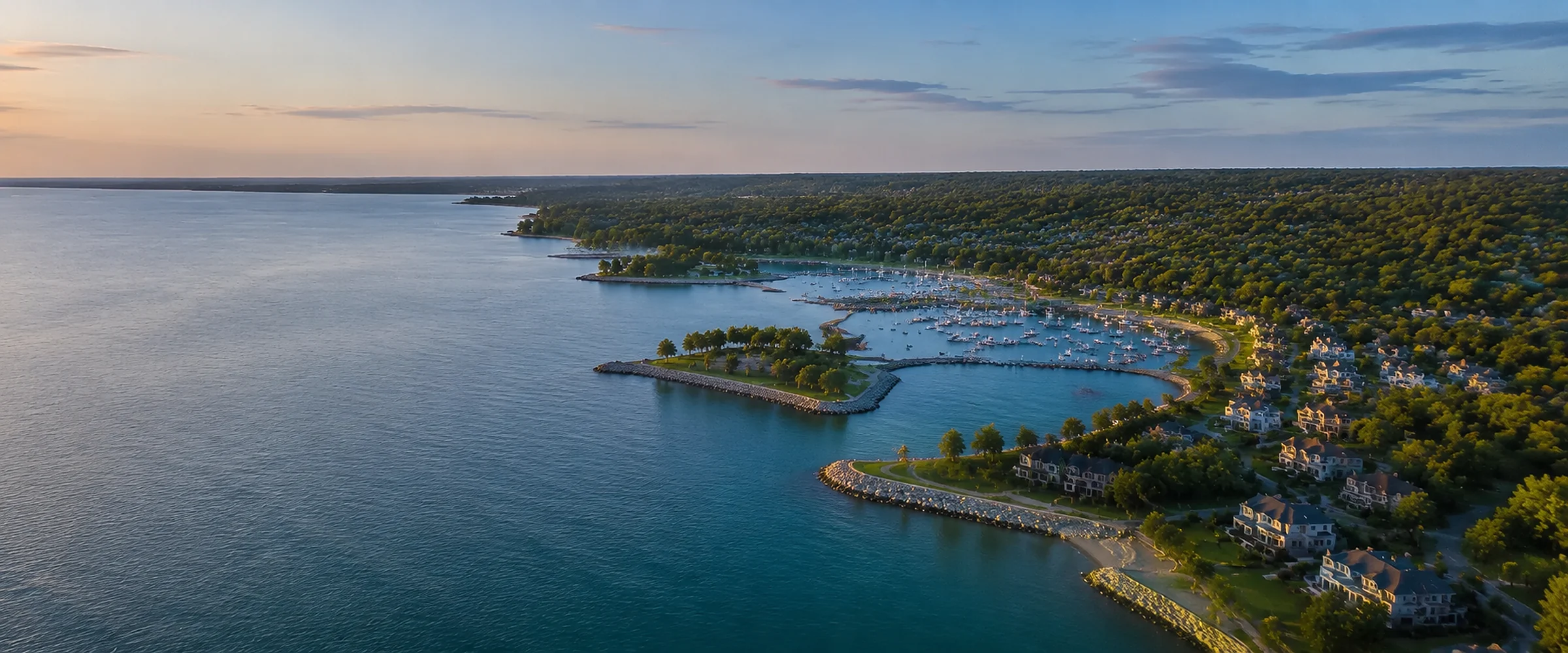 Camera drone capturing the Oakville lakeshore at dusk