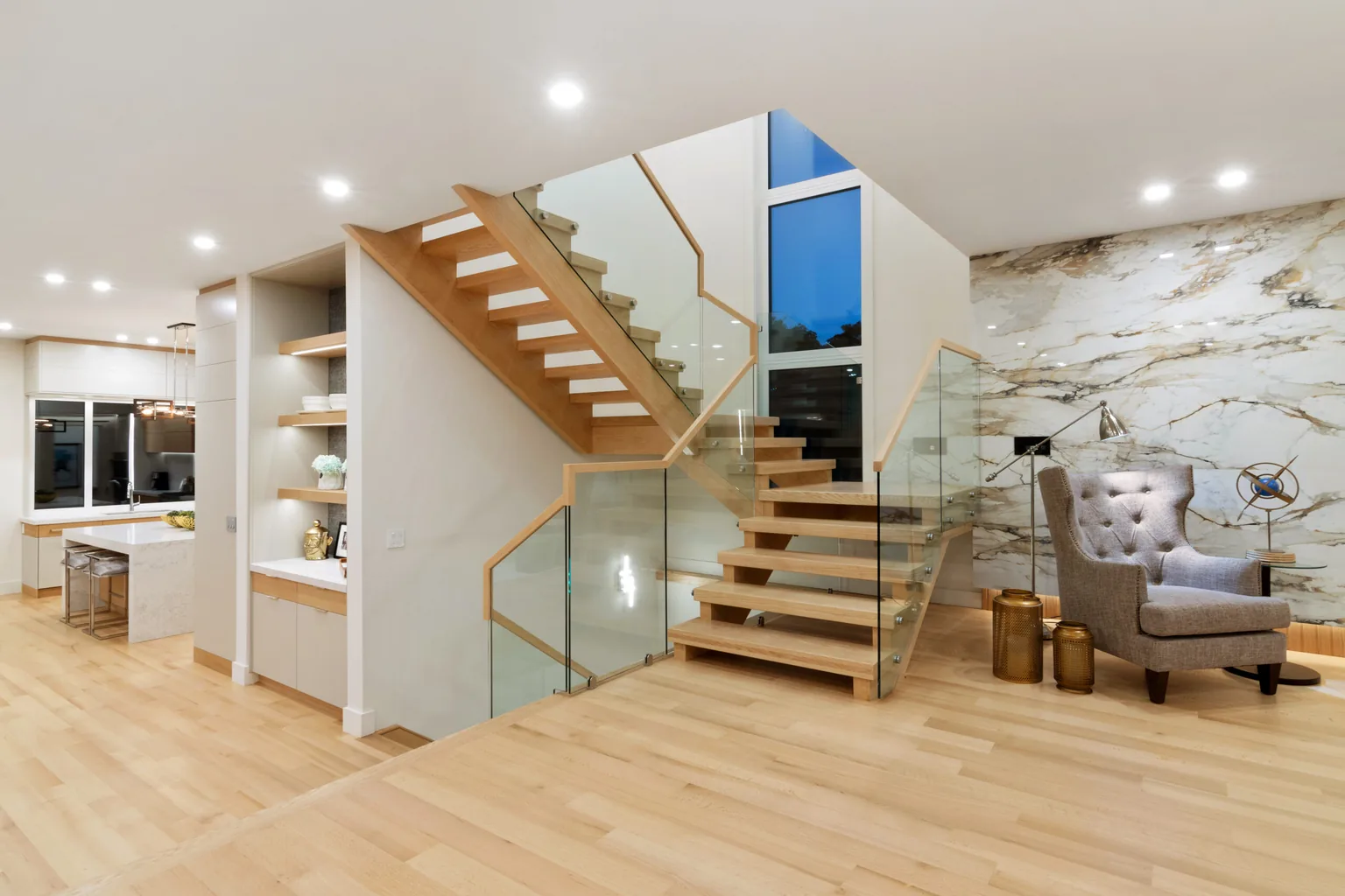 HDR real estate photography of a Richmond Hill foyer with a floating staircase