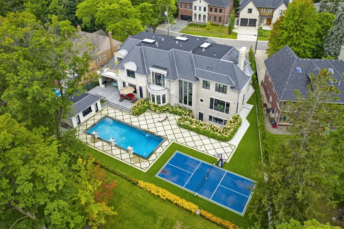 Luxury GTA estate with pool and tennis court photographed from the air by Odyssey3D