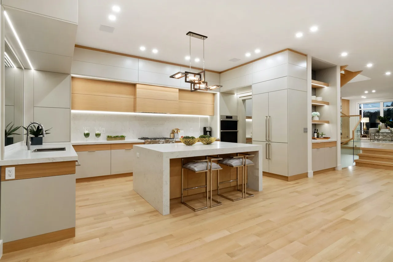 Professionally photographed Vaughan condo kitchen with the VMC skyline through the glass
